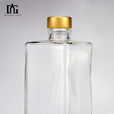 Botella de vidro de vodka transparente de 750 ml de forma quadrada com o logotipo do cliente aceitável