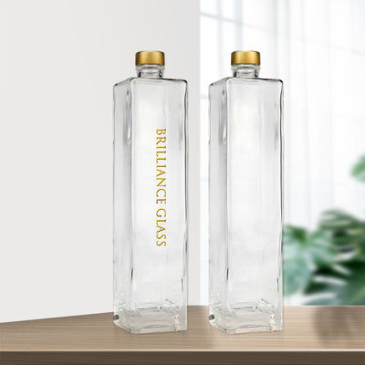 Botella de vidro de vodka transparente de 750 ml de forma quadrada com o logotipo do cliente aceitável