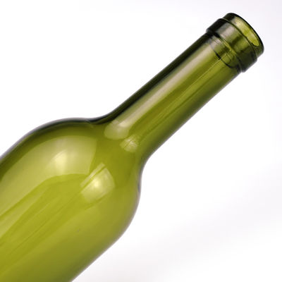 Botella de vidro de 750 ml Prime Color para bebidas alcoólicas de vinho tinto Forma redonda Capuz de parafuso de cortiça de cor verde