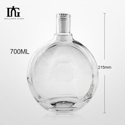Garrafa de vidro de superfície lisa irregular redonda personalizada para produção de whisky de gin de 700 ml