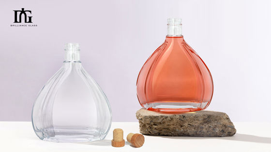 Garrafa redonda transparente de 700 ml de 750 ml de vidro Vodka Whisky Rum com tampa de parafuso e amostra