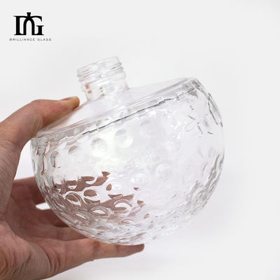 Botão de vidro transparente de 700 ml com forma de crânio única e cortiça gravada